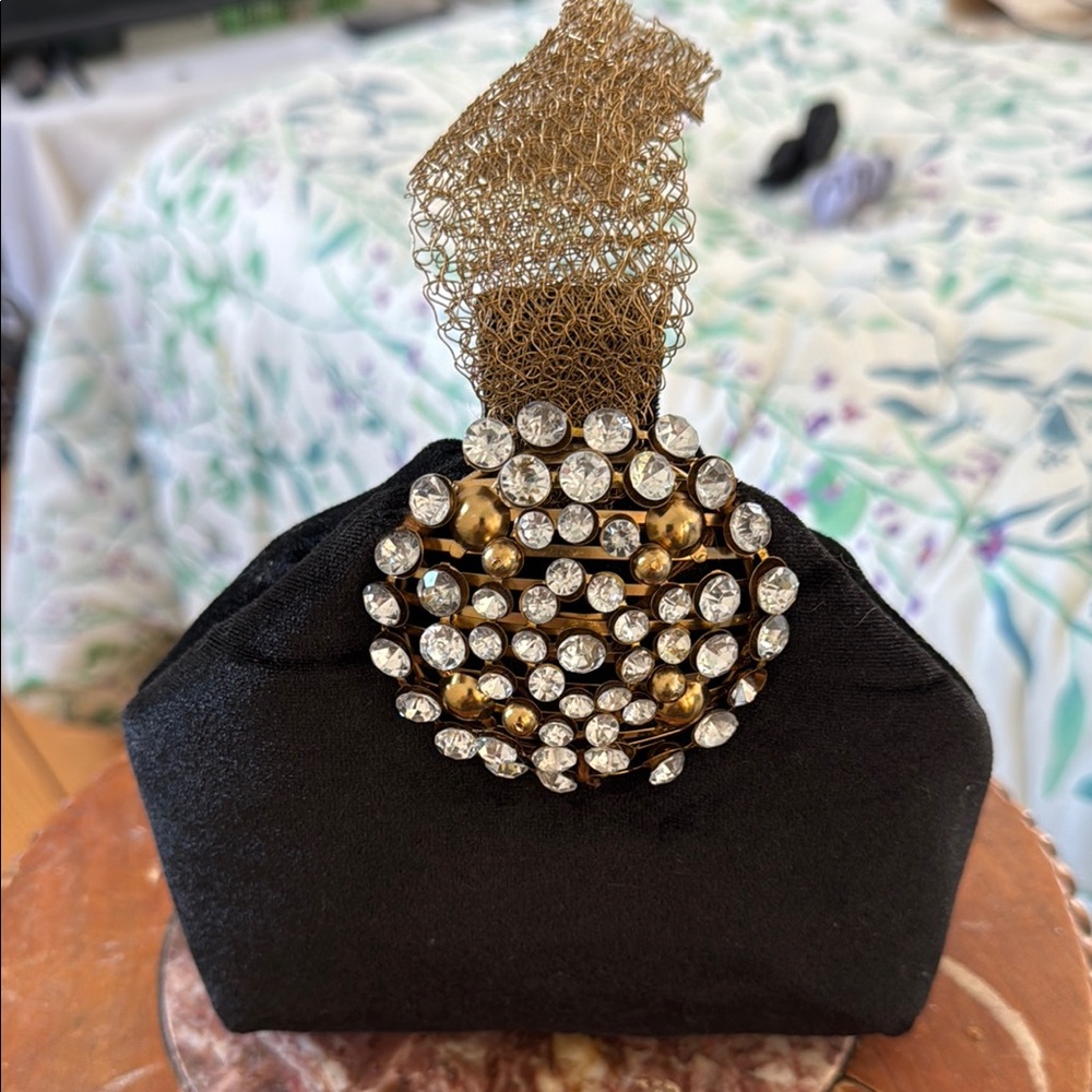 Elegant Black Clutch with Gold and Silver Accents